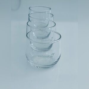 Swiss Air 4 NEW unique shot glasses.